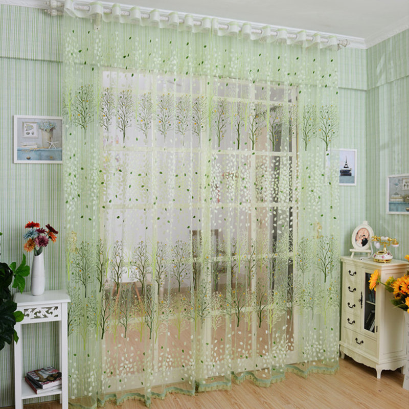Pale green transparent curtain in the doorway