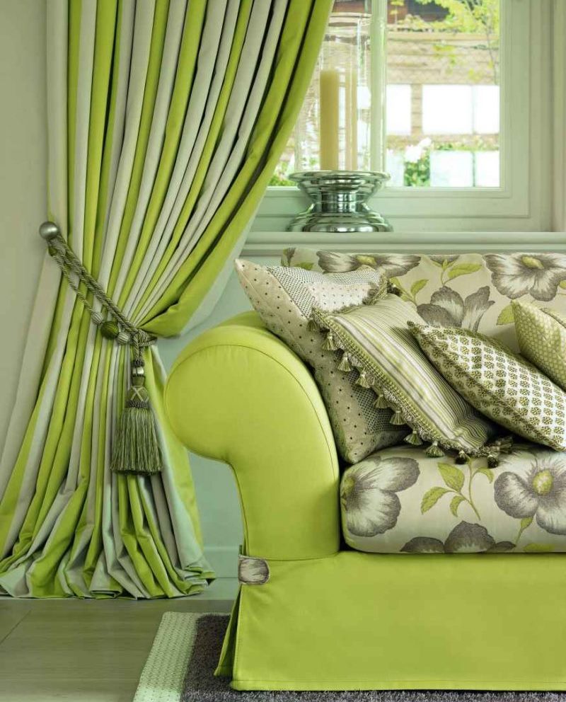 Sofa in the living room with light green upholstery