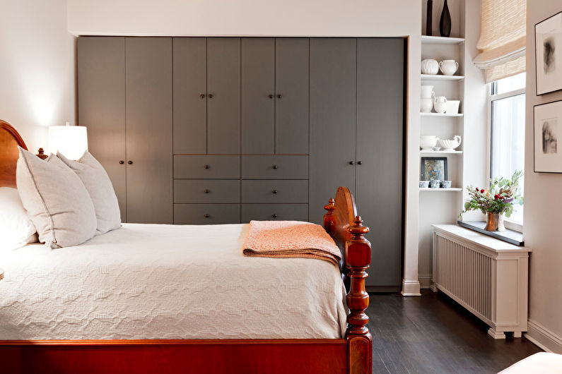 Gray fitted wardrobes in the narrow bedroom