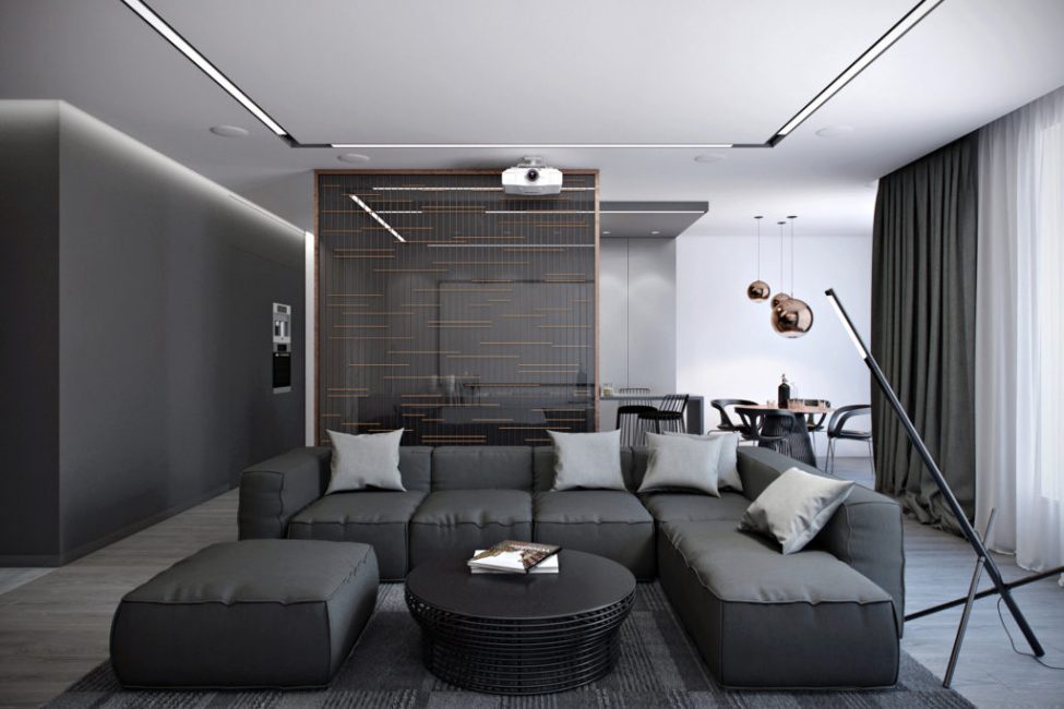 Corner gray sofa in the high-tech style hall