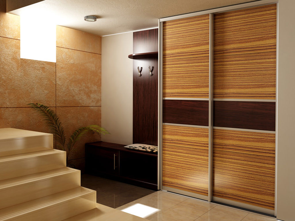 Wardrobe from laminated particleboard in the hallway of a private house