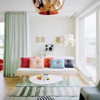 Bright decorative pillows on the living room sofa