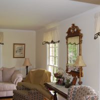 Short curtains on small hall windows in a private house