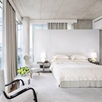 Gray ceiling in a bright bedroom