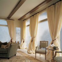 Beige curtains on panoramic windows