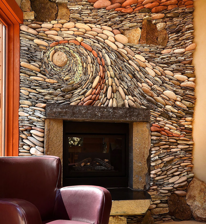 Wall decoration over the fireplace with natural stone