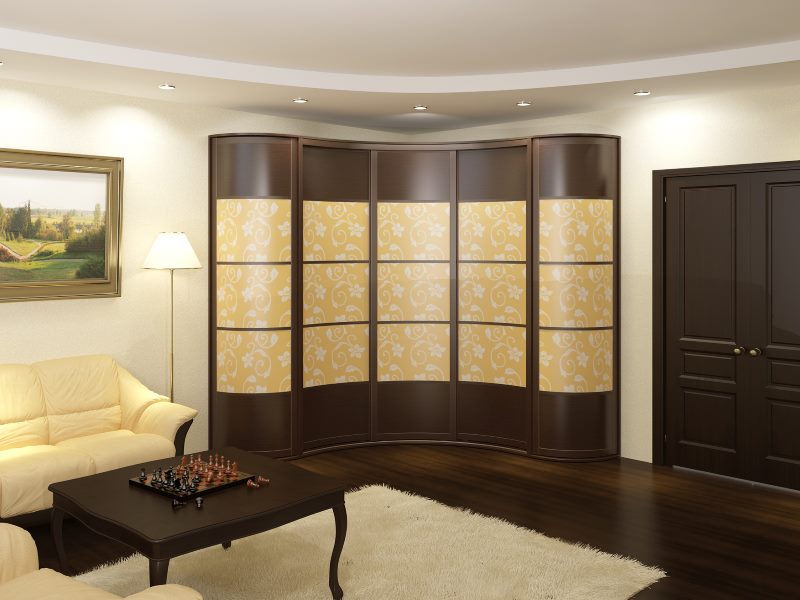 Sliding wardrobe with combined doors in the corner of the living room