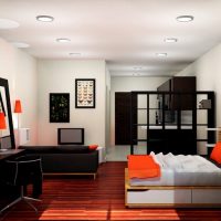 Melnas mēbeles studijas tipa dzīvokļa dizainā