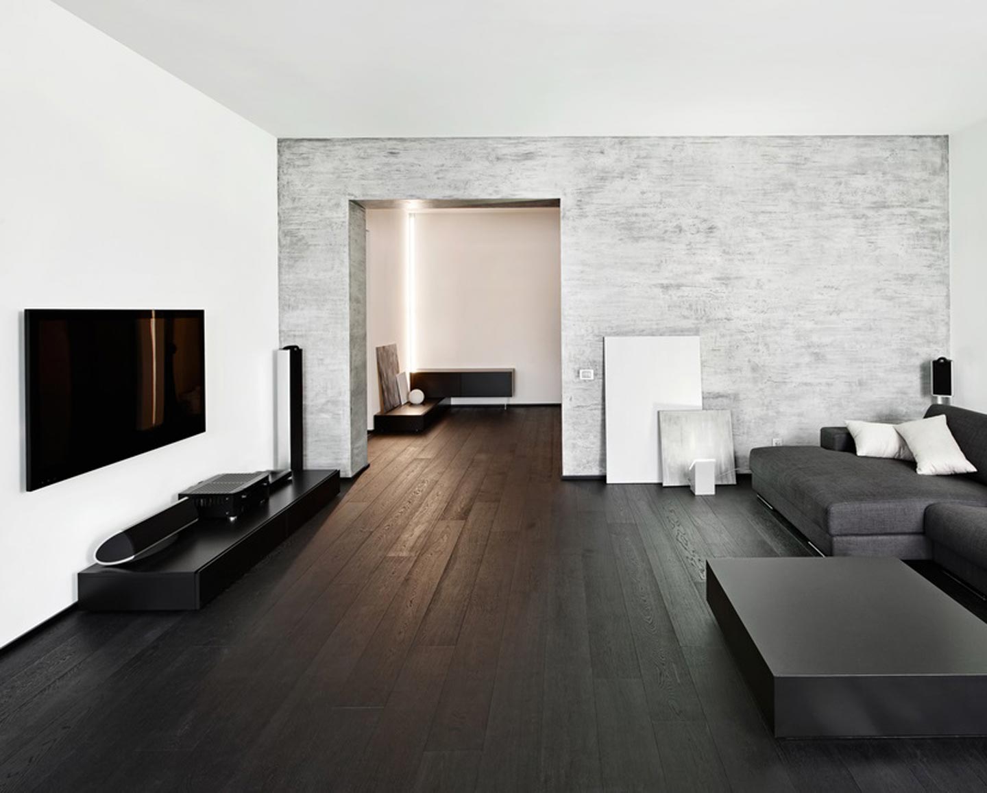 Dark wooden floor in the interior of the hall in the style of minimalism