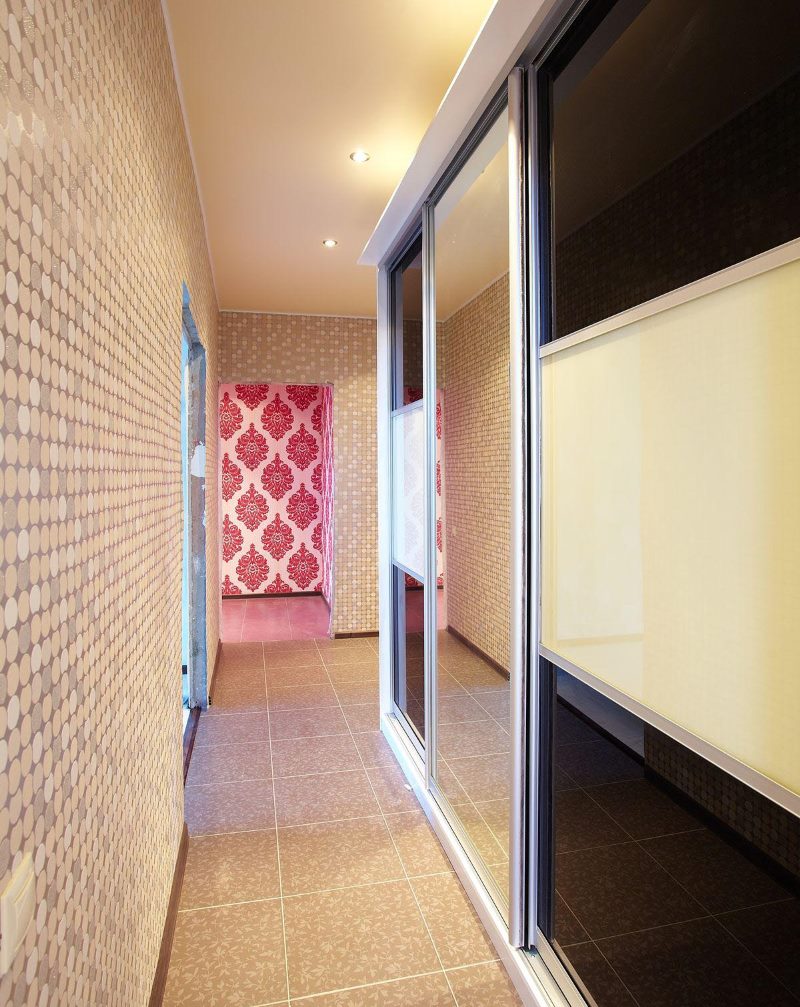 Wardrobe with sliding doors in a narrow corridor