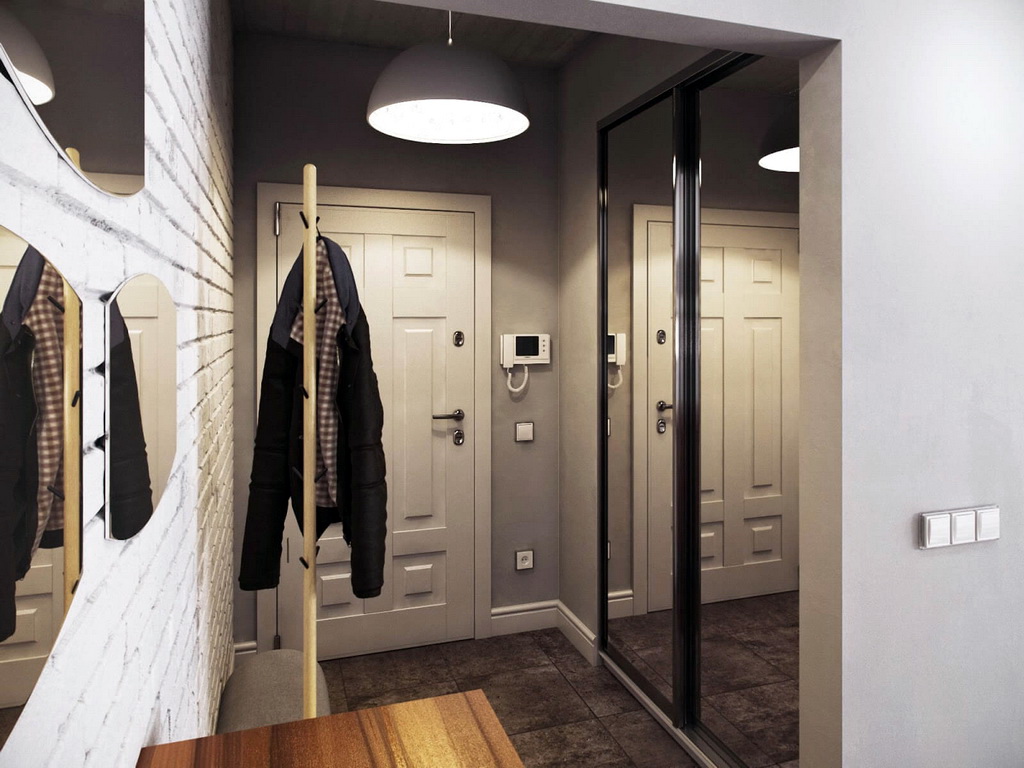 Interior of a small entrance hall with a built-in wardrobe