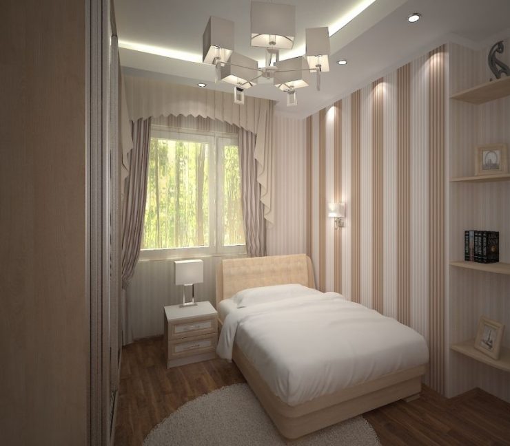 Single bed in the interior of a small bedroom