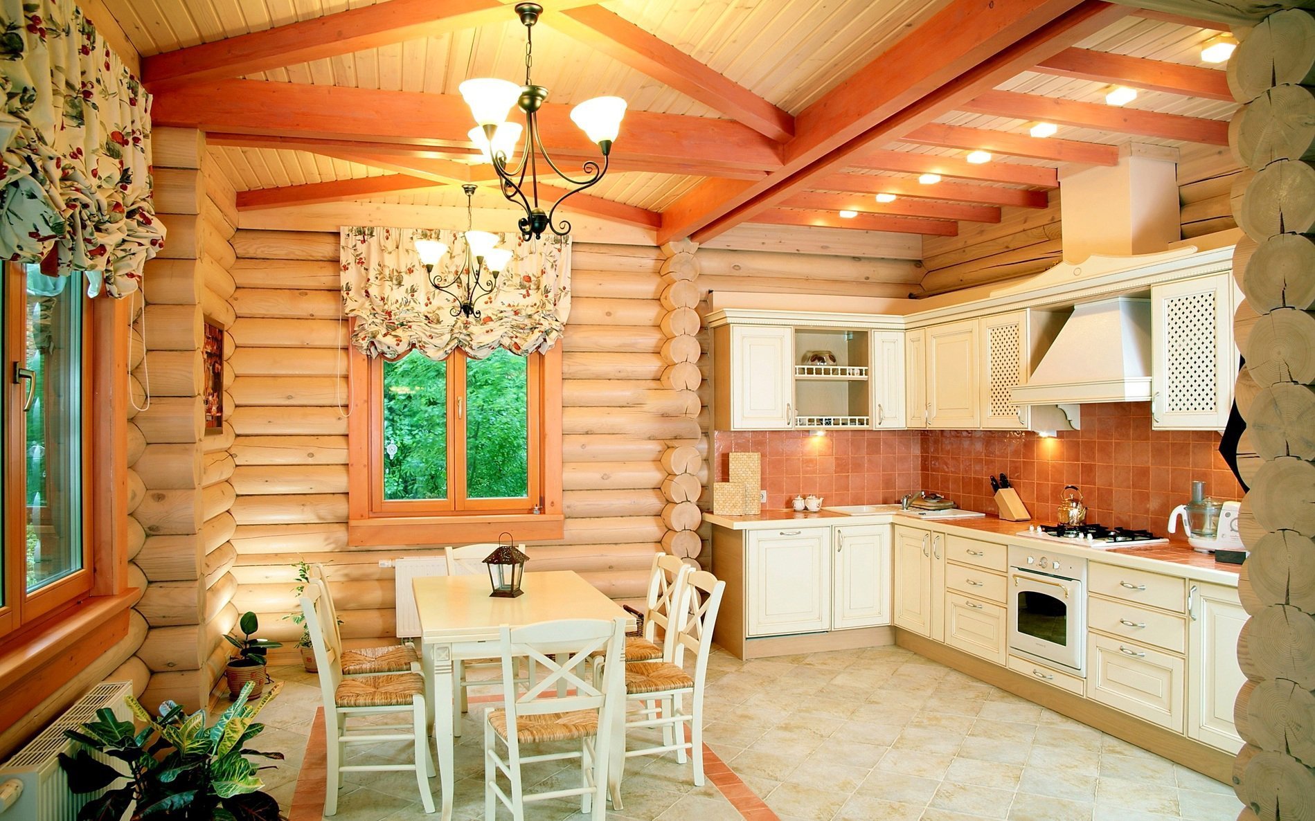 White kitchen in a log cabin kitchen