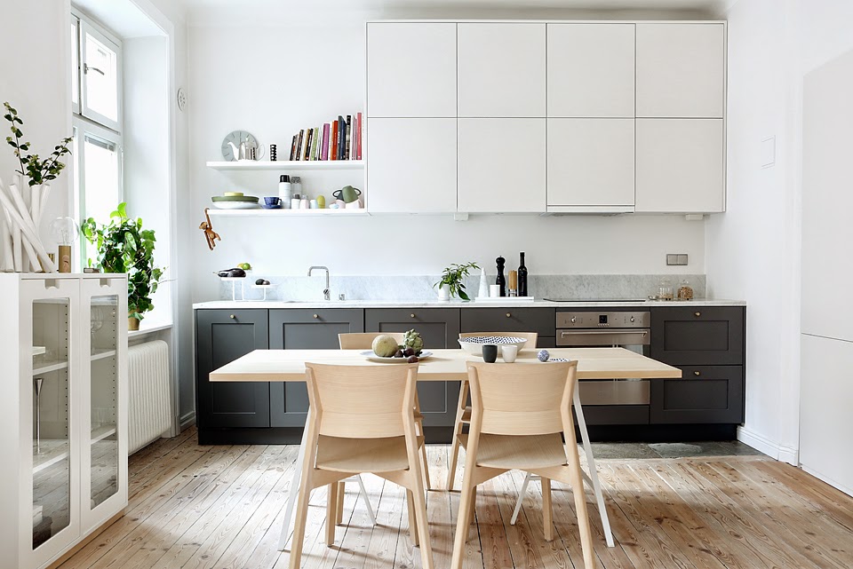 White hanging cabinets in a linear kitchen