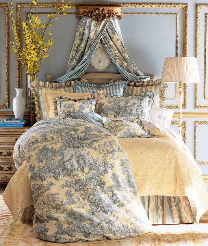 Colorful bedspread on beige bedding