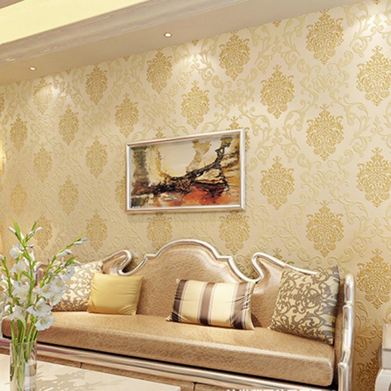 The picture on the wall of the living room with beige wallpaper