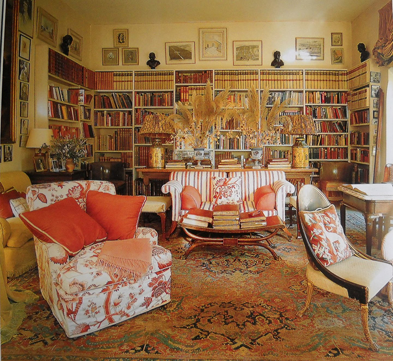 Interior of a living room with a library in a private house