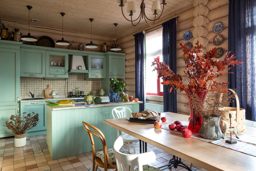 The interior of the kitchen-living room in a wooden country house
