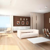 The combination of brown and beige in the design of the living room
