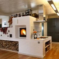 Russian stove in a modern kitchen-living room