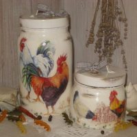 Drawings of roosters on glass jars