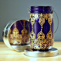 Gold painting on glass of a regular can