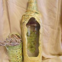 Pasting a bottle with an old curtain