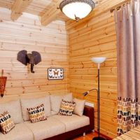Cozy living room with wood paneling