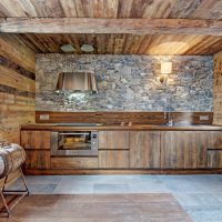 Wooden kitchen with stone apron