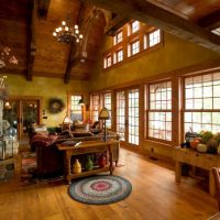 Rustic living room with large windows