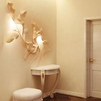 Skilful stucco molding from plaster in a hall of a city apartment