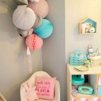 Paper balls in the interior of a room for a girl