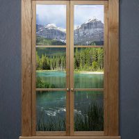 Picturesque landscape in a wooden window