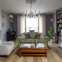 Small sofa with striped upholstery