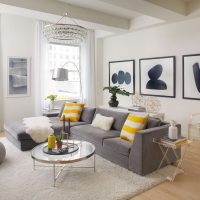 Zoning the living room with a gray carpet