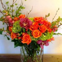 Floral arrangement with red roses