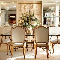 Classic chairs with gilding on wooden legs