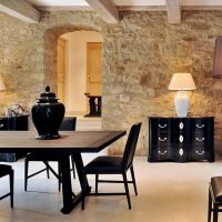 Black living room furniture with stone cladding