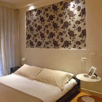 Bedroom wall decor with floral wallpaper
