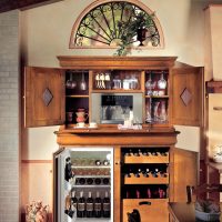 Wooden kitchen cabinet with built-in fridge