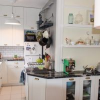 Design a narrow working area of ​​the kitchen-living room