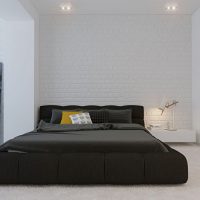 Black bed on gray carpet