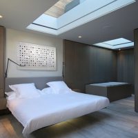 Bedroom of a country house with skylights