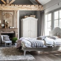Spacious bedroom with wooden beam