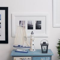 Model of a yacht on a dresser in a children's room
