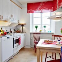 Red color in a white kitchen