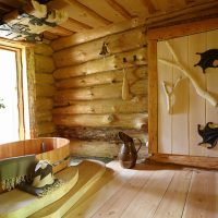 Wooden bathtub in a log house