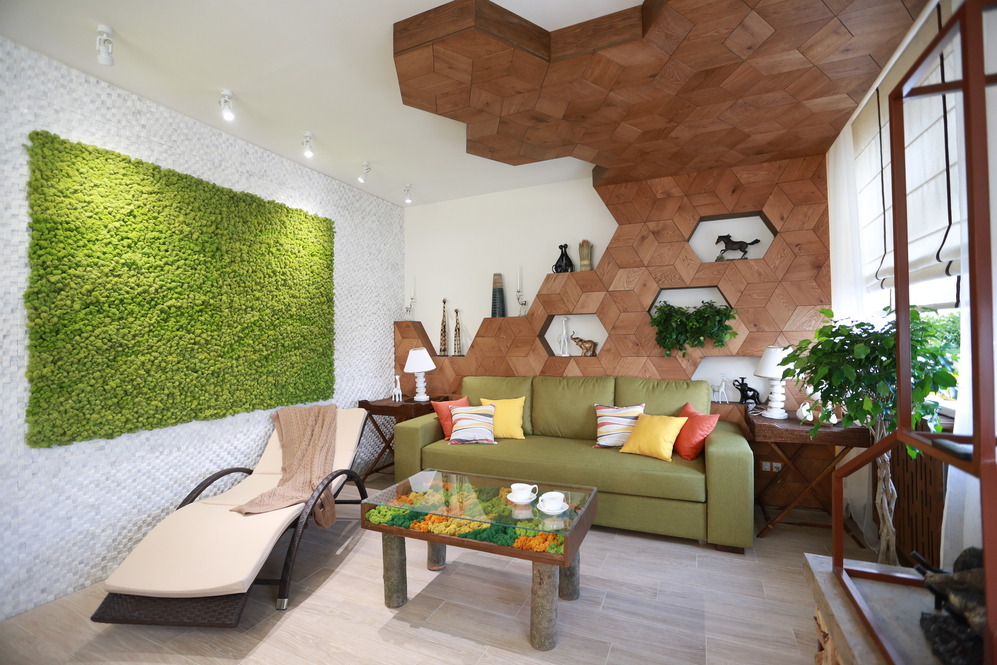 Green mural on the living room wall in eco-style
