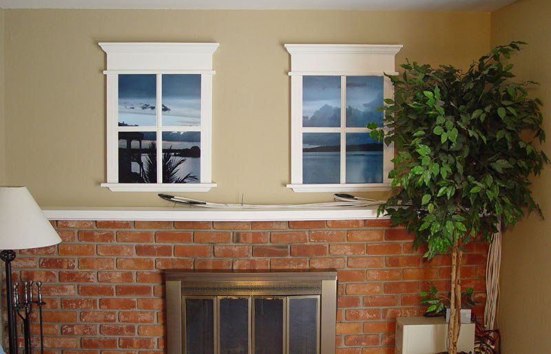 Two false windows on the wall with brickwork