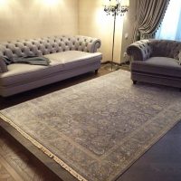 Thin carpet in gray shades